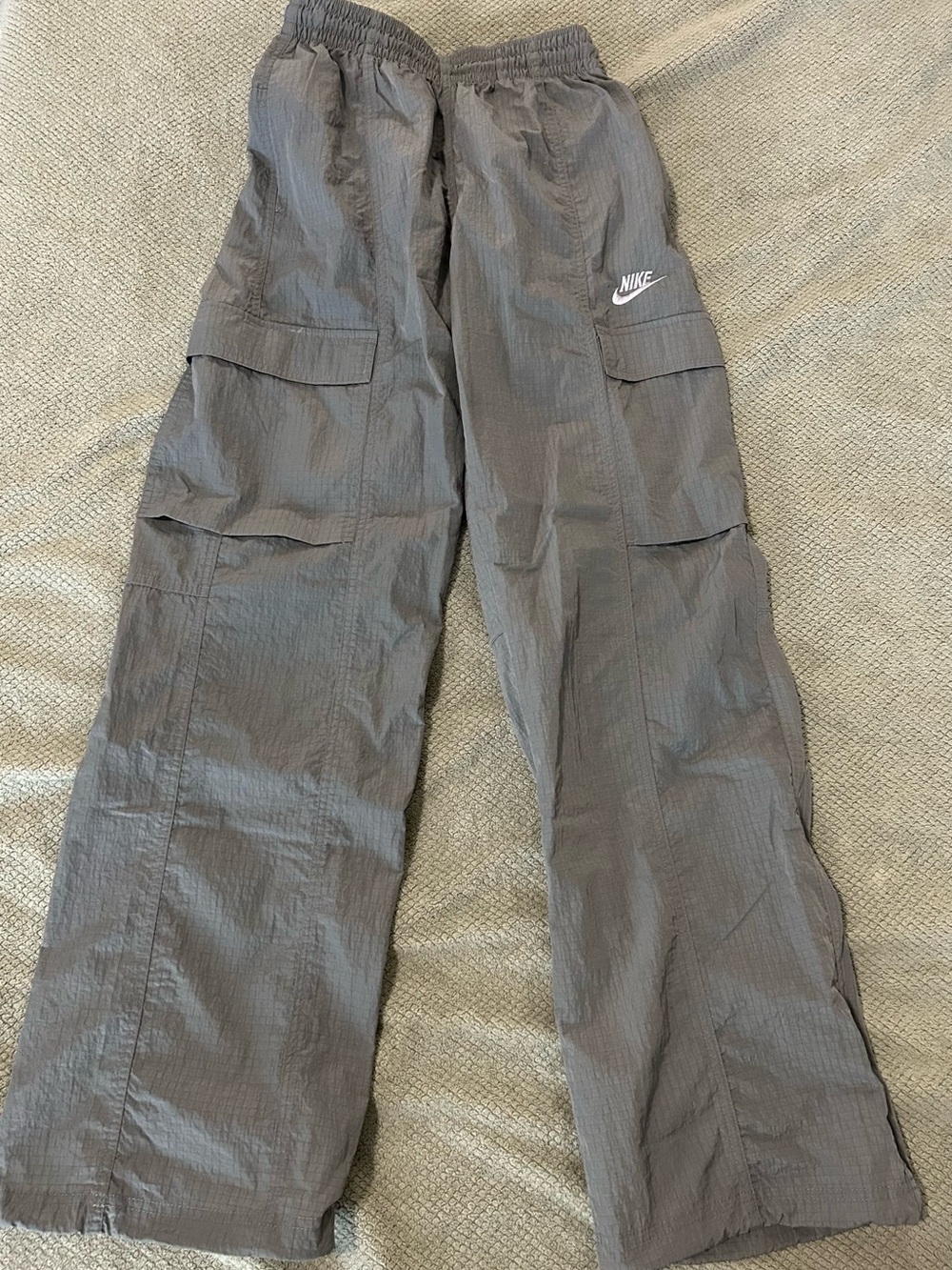 Women’s Nike Gray Cargo Windbreaker Pants with White Swoosh Logo